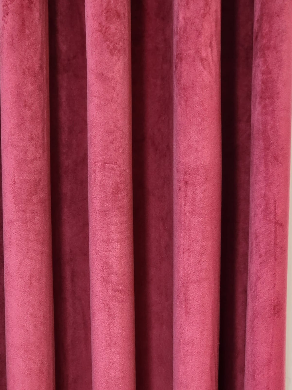 Dark maroon velvet curtain