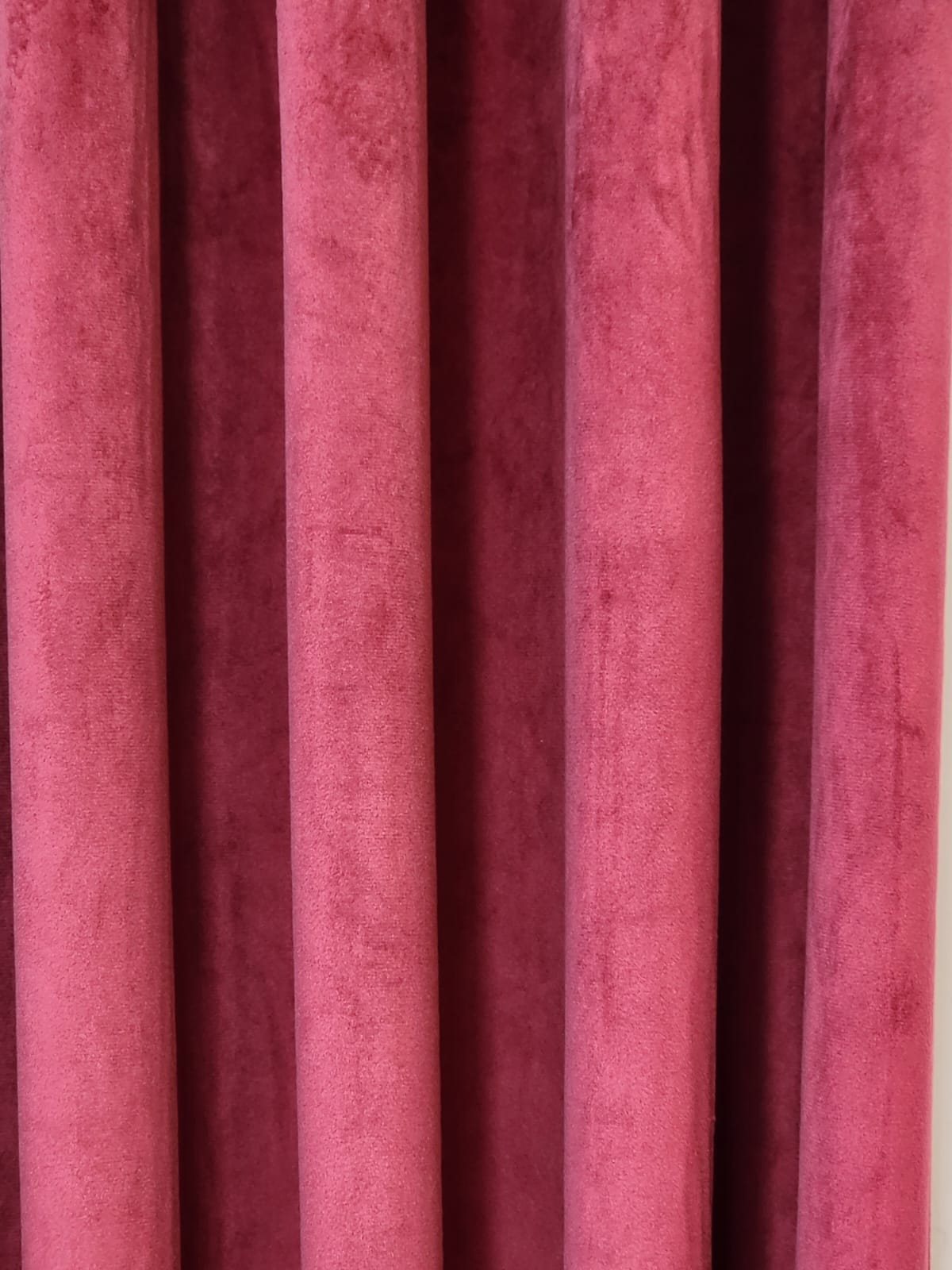 Dark maroon velvet curtain
